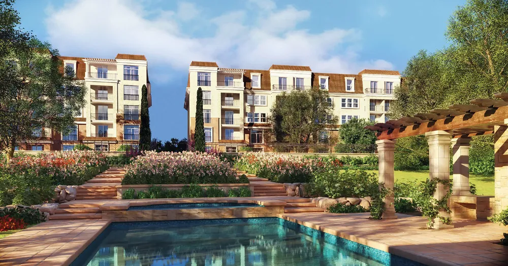 Sarai clubhouse pool and gardens with residential buildings behind